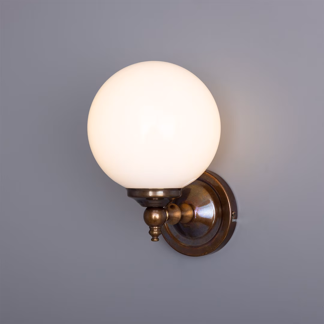 Cloghan Opal Glass Globe Wall Sconce - Antique Brass